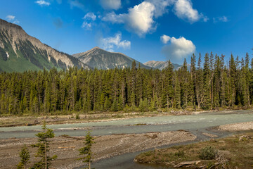 Fototapeta na wymiar Rockies, forests and river along the Banff Windermer HWY Kootenay National Park British Columbia Canada