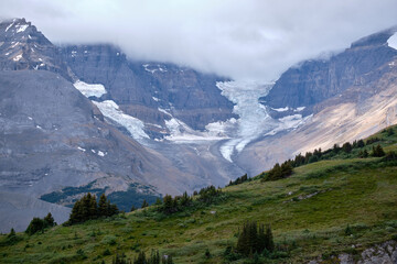 Fototapeta na wymiar Dome Glacier descends from Columbia Icefield leaving piles of moraine