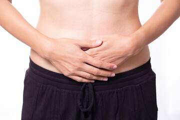 Naklejka premium close up woman has stomachache or menstrual isolated on white background, medicine and healthy concept