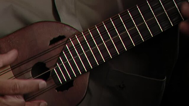Man Playing a "Charango", Small Andean Stringed Instrument, Jujuy, Argentina. Close Up.