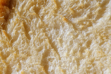 Fototapeta na wymiar Texture of toasted bread. Toast is sliced bread that has been browned by radiant heat