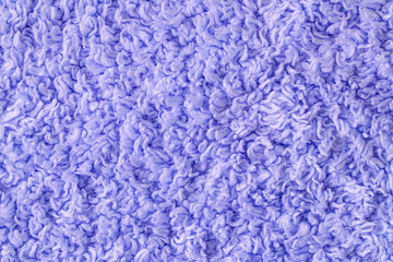 Bliue fluffy fur fabric wool texture background. Fluffy fabric texture.