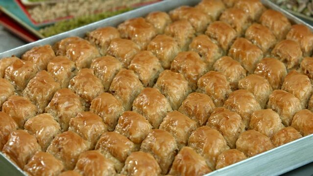 Traditional turkish baklava pistachio pastry. Dilberdudagi, ozel kesim baklava, cikolatali baklava, fistikli baklava, katmer, fistikli kadayif, kattafi, fistik sarma, soguk baklava, midye baklava, cev