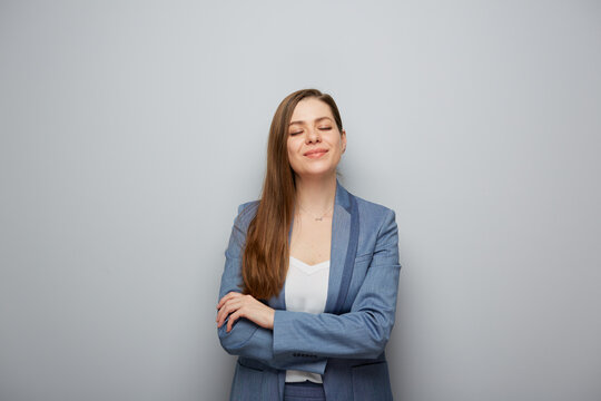 Dreaming woman in business suit with closed eyes. Isolated female portrait.