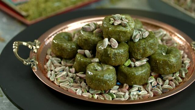 Traditional turkish baklava pistachio pastry. Dilberdudagi, ozel kesim baklava, cikolatali baklava, fistikli baklava, katmer, fistikli kadayif, kattafi, fistik sarma, soguk baklava, midye baklava, cev
