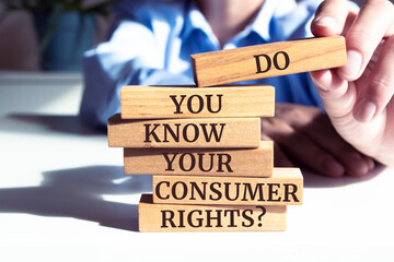 Close up on businessman holding a wooden block with 