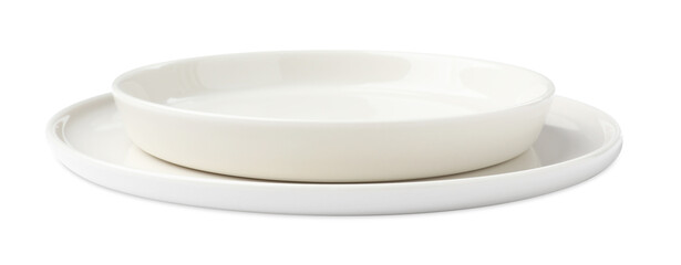 Beautiful empty ceramic plates on white background