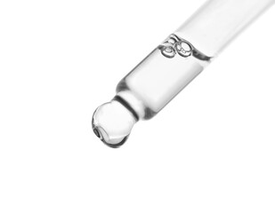 Dripping clear facial serum from pipette on white background, closeup