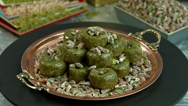 Traditional turkish baklava pistachio pastry. Dilberdudagi, ozel kesim baklava, cikolatali baklava, fistikli baklava, katmer, fistikli kadayif, kattafi, fistik sarma, soguk baklava, midye baklava, cev