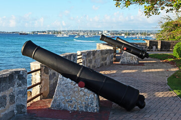 Vintage canons line the ramparts at the Charles Fort in Bridgetown Barbados.