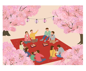 満開の桜の下でお花見をする人々