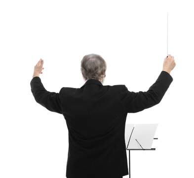 Professional conductor with baton and note stand on white background, back view