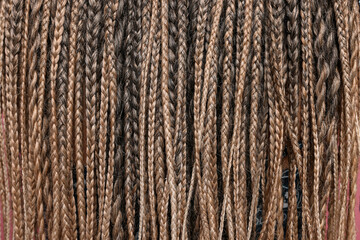 Many african braids as background, closeup view