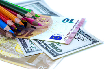 A set of color pencils and money.A School stuff.Drawing supplies