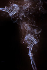 Smoke motion on black background.