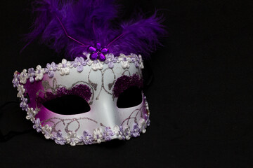 colorful carnival mask on a black background