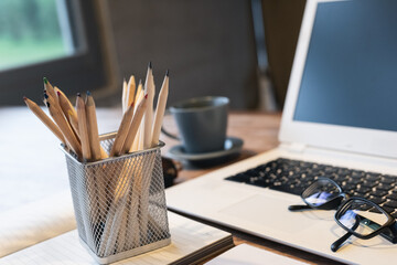pencils and laptop