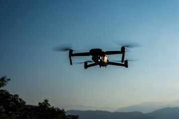 Fototapeta na wymiar flying drone in the outdoor