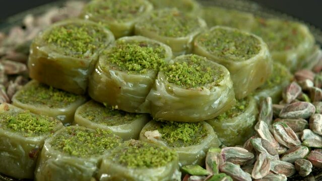 Traditional turkish baklava pistachio pastry. Dilberdudagi, ozel kesim baklava, cikolatali baklava, fistikli baklava, katmer, fistikli kadayif, kattafi, fistik sarma, soguk baklava, midye baklava, cev