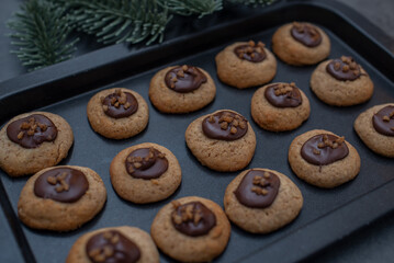 sweet home made chocolate christmas cookies on a christmas table