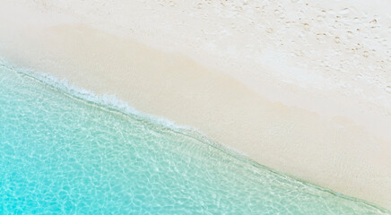 The ecology with Waves on the beach as a background. Beautiful natural background at the summer time-above view