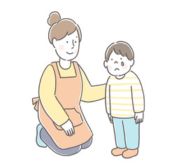 子供を慰めるエプロンの女性