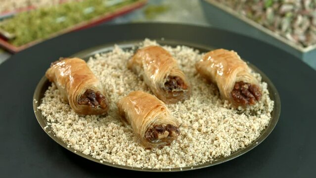 Traditional turkish baklava pistachio pastry. Dilberdudagi, ozel kesim baklava, cikolatali baklava, fistikli baklava, katmer, fistikli kadayif, kattafi, fistik sarma, soguk baklava, midye baklava, cev