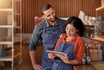 Restaurant, cafe owner and couple with tablet to manage orders, inventory and stock. Interracial...