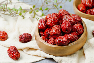 fresh korean jujube fruit in wood bowl