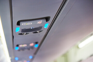close up of no smoking and belt sign on plane