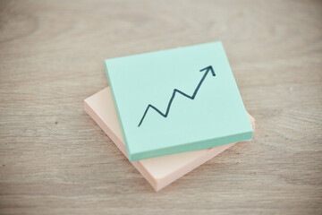 Growth, investment and success with arrow on sticky note for finance, stocks and goal. Price increase, target and profit with progress on graphic chart on paper for winner, statistics and economy
