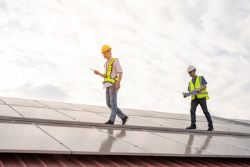 Engineering team working on checking and maintenance in solar power plant, Solar panel technician...