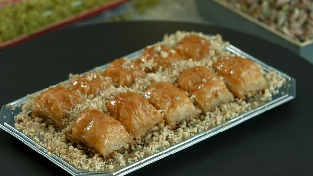 Traditional turkish baklava pistachio pastry. Dilberdudagi, ozel kesim baklava, cikolatali baklava, fistikli baklava, katmer, fistikli kadayif, kattafi, fistik sarma, soguk baklava, midye baklava, cev