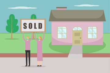 Obraz na płótnie Canvas Happy couple showing sold house sign