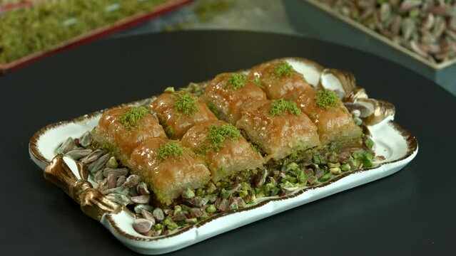 Traditional turkish baklava pistachio pastry. Dilberdudagi, ozel kesim baklava, cikolatali baklava, fistikli baklava, katmer, fistikli kadayif, kattafi, fistik sarma, soguk baklava, midye baklava, cev