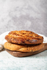 Poppy bread. Bread prepared with poppy on stone background. close up