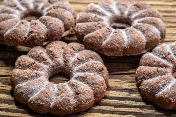 Tasty cookies biscuits on wooden background