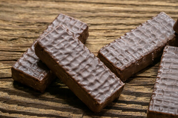 Chocolate cookies on wooden table.