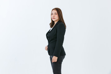 Portrait isolated cutout studio full body shot of Asian confident female professional successful businesswoman in formal black suit high heels standing post look at camera on white background