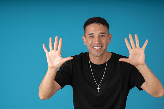 Young man posing as a mime