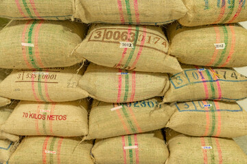 bags of coffee in storage ready for export