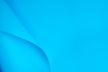 defocus blue wave from paper. Abstract blue geometry background with copy space. Concepts: lines and geometry.