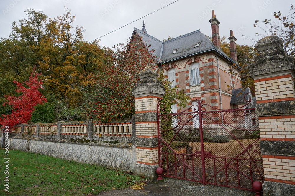 Wall mural closeup of an old english country house in France in the fall