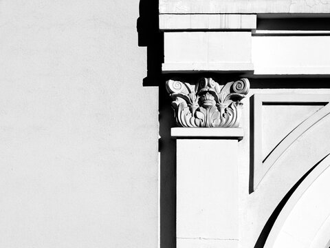 Details of the facade with chiaroscuro. The contrast of light and shadow on the facade.