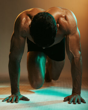 Fitness neon, exercise push up and man in studio isolated on brown background. Sports, wellness and male model or bodybuilder exercising, workout or training pushup for heath, body care and strength