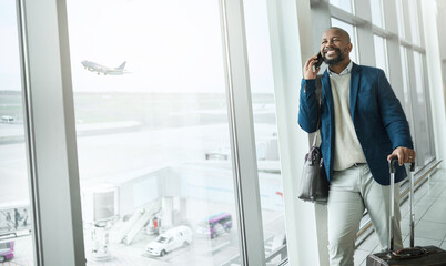 Businessman, phone call and luggage waiting at airport for travel, work trip or plain journey to country. Happy black man, employee or person with smile for communication before flight on smartphone - obrazy, fototapety, plakaty