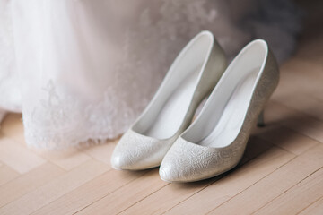 Beautiful wedding shoes. Bridal shoes for the wedding day.
Bride's shoes for wedding day.