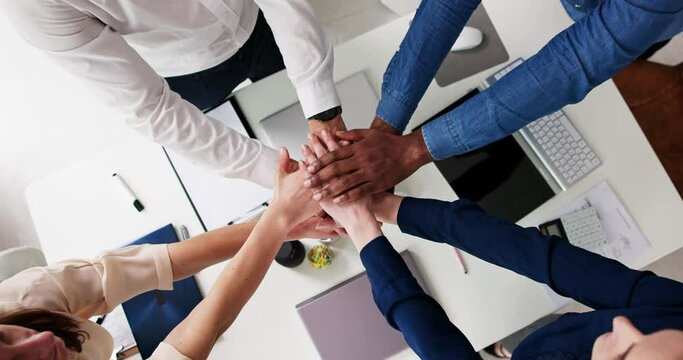 Directly Above Shot Of Medical Team Stacking Hands Together