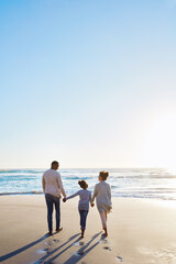 Family, beach and walk during sunset on vacation or holiday relaxing and enjoying peaceful scenery...