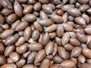 Obraz premium Background and texture of peeled pecans